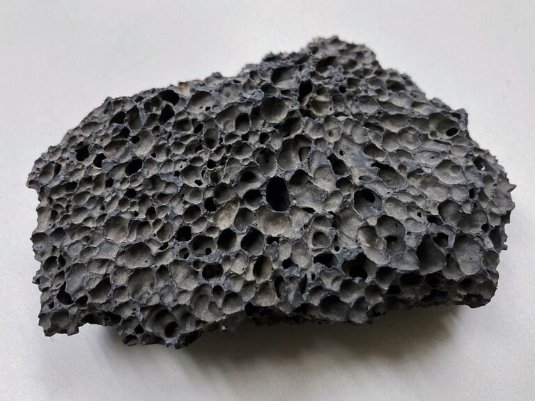 Scoria rock - highly vesicular dark-colored extrusive igneous rock